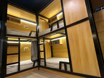 a room with four bunk beds in it at Luxury Hostel Bedspace in Downtown Near Emirates Towers Metro in Dubai