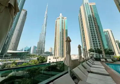 a view of the city from the balcony at Stylish 2BR Downtown Dubai in Dubai