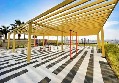a pavilion at a playground at the beach at Conveniently Located Minutes from Dubai Hills Mall, Park, Golf Club, and Essential City Landmarks 1BR with Premium Facilities, Damac Hills Golf Vita A, Damac Hills 1 by Deluxe Holiday Homes in Dubai
