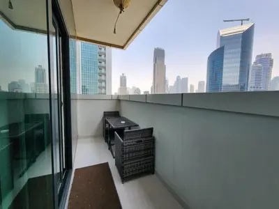 a balcony with a view of a city skyline at Stylish Suites 1 Br Business Bay in Dubai