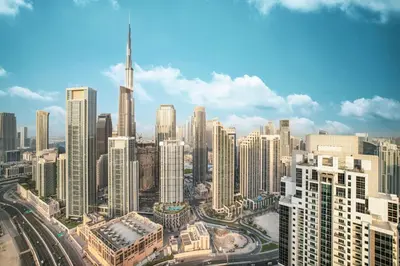 an aerial view of a city with tall buildings at Luxury 2BR with Burj Khalifa View l High Floor at Paramount in Dubai