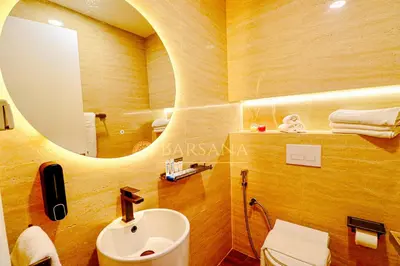 a bathroom with a sink and a mirror at Barsana - Premier 3Bed Suite - Marina & Sea Views in Dubai