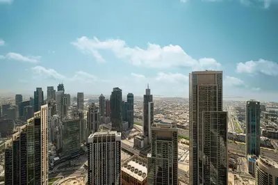 an aerial view of a city with tall buildings at Luxury 2BR Sea Burj views Khalifa infinity pool in Dubai