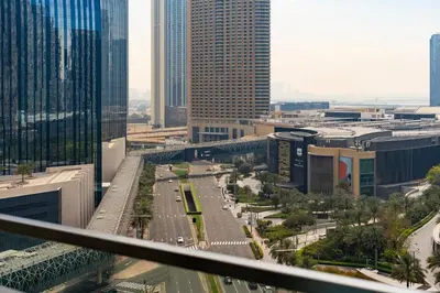 a view of a city with many tall buildings at Private Room in Luxurious 3BR Apartment with BURJ KHALIFA view in Downtown near Dubai Mall in Dubai