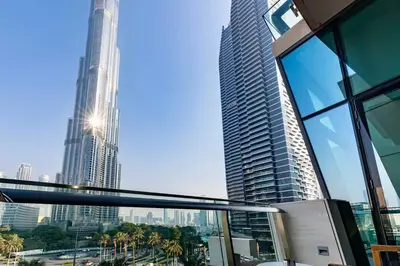 a view of a city skyline from a building at Private Room in Luxurious 3BR Apartment with BURJ KHALIFA view in Downtown near Dubai Mall in Dubai