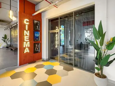 a lobby with a yellow and white checkered floor at FIRST CLASS 1BR Modern with Tranquil Touch in Dubai