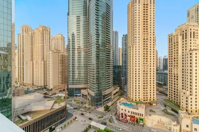 an aerial view of a city with tall buildings at FIRST CLASS 1BR Stylish Beachfront Escape in Dubai