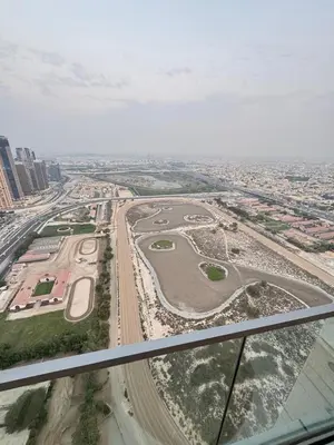 an aerial view of a city with roads and buildings at Luxury 2BR Canal front & Burj Khalifa views- High Floor in Dubai
