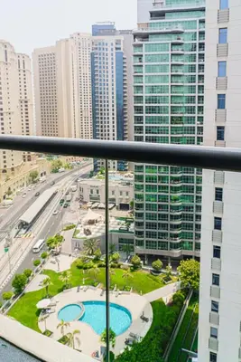 a view of a city from a balcony at Modern 2BR Apartment at JBR in Dubai