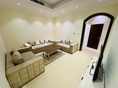 a living room with two couches and a tv at Dubai Al Barsha Villa Fully Furnished Luxury Private Master Room Ensuite Huge Space Deluxe in Dubai