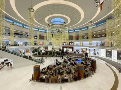 an image of a shopping mall with christmas decorations at Skyline Views Chic 1BR with Canal Vibes in Dubai