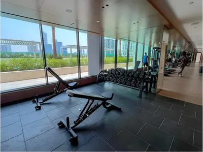 a gym with two exercise bikes in a building at 2 Bed, Private Pool, Big Terrace, Solysian Stay in Dubai