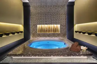 a bathroom with a blue tub in a room at Vogue Business Bay Damac Cour Jardin close to Downtown, Burj Khalifa and Dubai Mall, Studio Apartment with City View, Access to all Amenities in Dubai