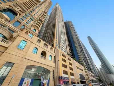 a group of tall buildings in a city at FIRST CLASS1BR Sea View and Near Beach and Tram in Dubai