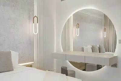a bedroom with a dressing table and a mirror at FIRST CLASS1BR Sea View and Near Beach and Tram in Dubai