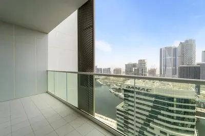 a balcony with a view of a city skyline at Cozy 1BR at Reva Residences in Dubai