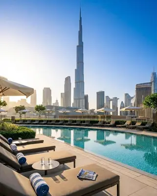 a large swimming pool with a view of the city at Vida Dubai Mall! Excellent Amenities! Direct Access To Dubai Mall in Dubai