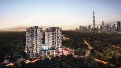 an aerial view of a building with a city in the background at Spacious & Modern 1BR in Wilton Terraces in Dubai