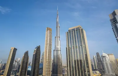 a group of tall buildings in a city at A&S Properties Downtown Dubai in Dubai