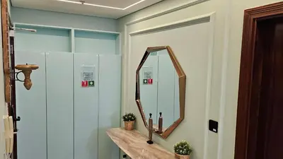 a mirror on a counter in a bathroom at Homeeza Luxury 2BR Apartment Sea Views Dubai Marina in Dubai