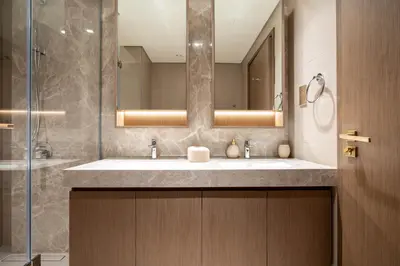 a bathroom with a sink and a mirror at KeyRock - Palm & Sea View Apt at Grand Bleu in Dubai