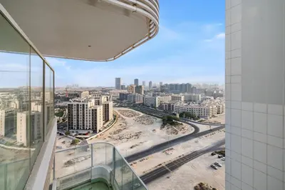 a view of a city from a building at ALiving Modern Studio I Private Pool I Opalz by Danube- 1308 in Dubai