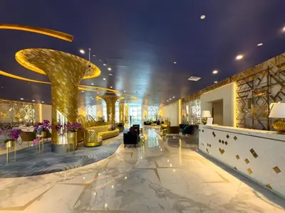 a lobby of a hotel with a large lobby at GuestReady - Canal View | Studio + Sofa Bed in Dubai