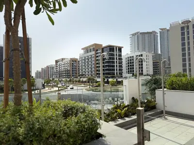 a view of a city skyline with tall buildings at ASHRI HH Condo In Riviera Meydan in Dubai