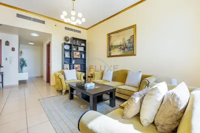 a living room with couches and a coffee table at Ain Dubai & Sea Views 2BR Unit Close to Beach, Shams 4, Jumeirah Beach Residence by Deluxe Holiday Homes in Dubai