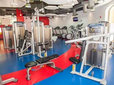 a gym with several treadmills and machines at Ain Dubai & Sea Views 2BR Unit Close to Beach, Shams 4, Jumeirah Beach Residence by Deluxe Holiday Homes in Dubai