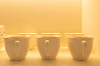 a row of white toilets in a room at KeyRock - Stylish 2BR Apt with Palm Jumeirah View, Balcony , Pool & Gym Access in Dubai