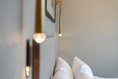 a close up of a door with lights on it at TRPS - Address Opera, Downtown - Burj Khalifa View, Luxury 3BR Living in Dubai