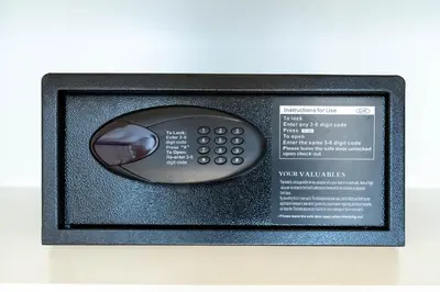 a black remote control in a black picture frame at KeyRock - Grand Bleu Escape with Iconic Palm Views in Dubai