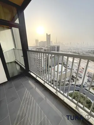 a balcony with a view of a city at Lux - 2BR - Spacious - Burj Khalifa View - New Bld in Dubai