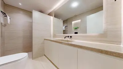 a bathroom with a sink and a toilet at Al Dabas 2 - Calm One Bedroom in Palm Jumeirah in Dubai