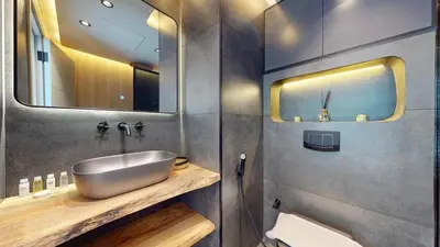a bathroom with a sink and a mirror at Ocean Heights - Upgraded Two Bed with Sea View in Dubai
