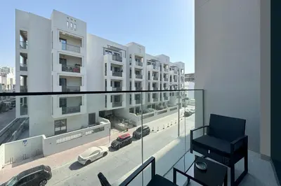 an apartment balcony with a view of a street at Stylish Duplex Autograph 1BR in Dubai