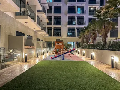 a playground in the middle of a building at Savis Homes - Luxury Brand New Studio in Elysee III in JVC in Dubai