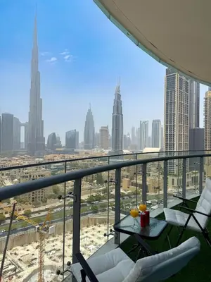 a view of the dubai city from the top of a building at Downtown Escape 2BR with Full BurjKhalifa Panorama in Dubai
