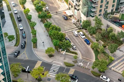 an aerial view of a busy city street with cars at The Boulevard Suite Stunning Burj Khalifa View Downtown in Dubai