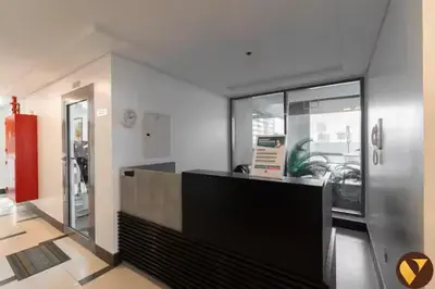 an office with a reception desk in a building at Vogue JVC Jeewar Tower near Circle Mall, One Bedroom Apartment with Balcony and City View, Access to all Amenities in Dubai