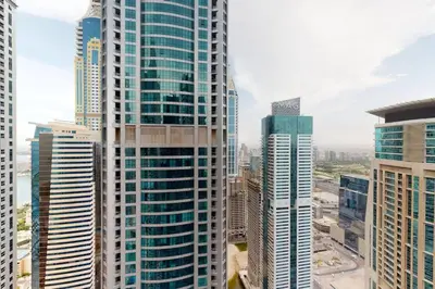 a group of tall buildings in a city at Citihome - Luxury 1BR Dubai Marina in Dubai