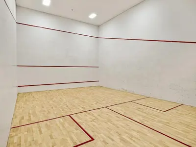 an empty gymnasium with a basketball court at VayK - Luxurious 1BR in JLT with Premium Amenities in Dubai
