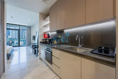 a kitchen with a sink and a counter top at Iconic Burj Khalifa View- Aspin Studio in Dubai