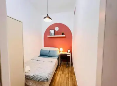 a small room with a bed and a table at City Edge Room In Barsha Heights Tecom in Dubai