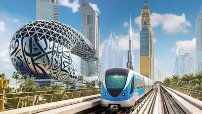 a blue and white train on the tracks in a city at Comfort Corner In Al Barsha 1 near Mall of Emirates in Dubai