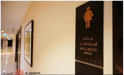 a sign on the side of a wall in a building at Dreamstay 2 BR in Business Bay in Dubai