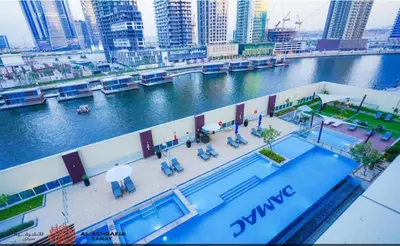 an aerial view of a building with a river at Dreamstay 2 BR in Business Bay in Dubai