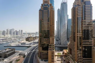 a view of a city with tall skyscrapers at Tranquil Studio at Botanica in Dubai