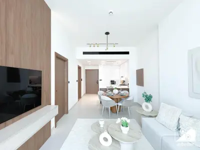a white living room with a couch and a table at Modern 1BR in JVC l Pool, Gym, Parking in Dubai